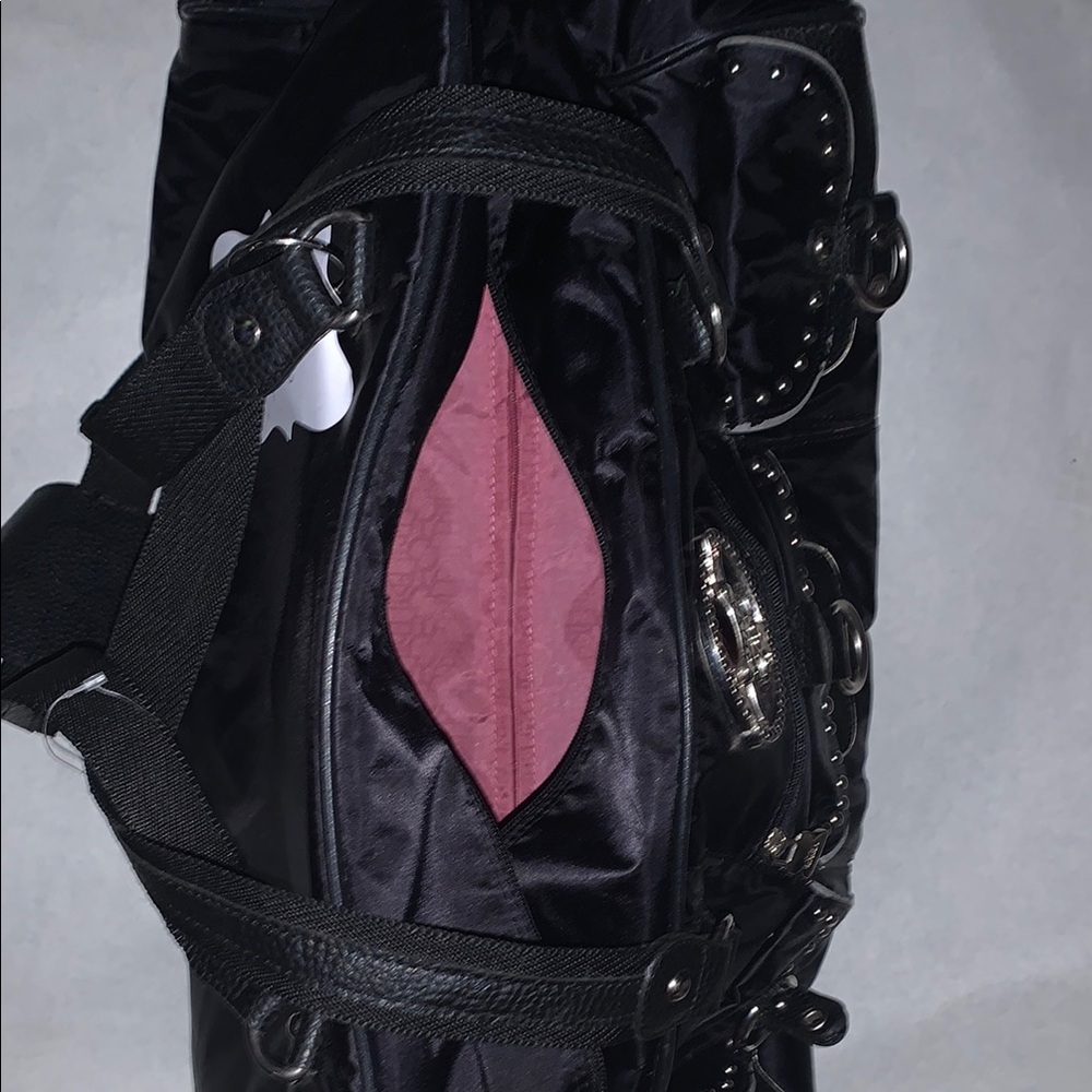 Kathy Van Zeeland Black Backpack with Sleek Design